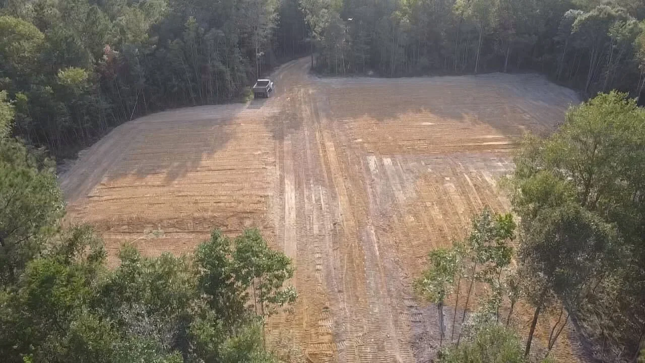 Land cleared and graded out of the pines by Pollard's Dozer Service