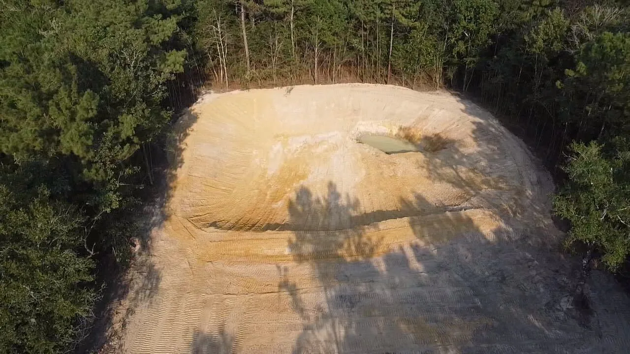 Pond basin dug and shaped in the sand